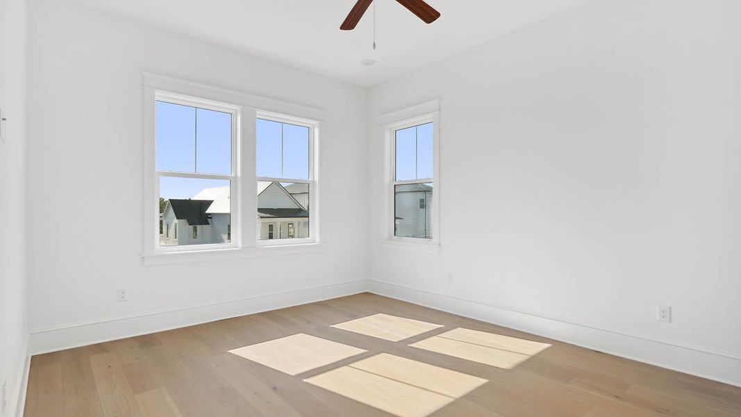 Representative unfurnished interior of a home built from the Cayman by D.R. Horton in Parkside, Santa Rosa Beach (Image 39).