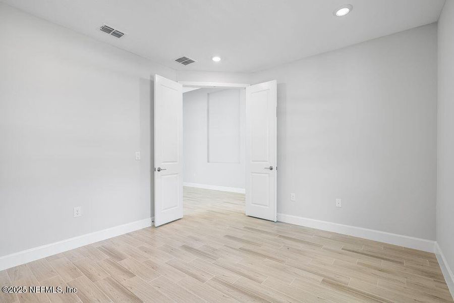 Spacious, unfurnished interior of a new home in Colbert Landings, Palm Coast (Image 24).