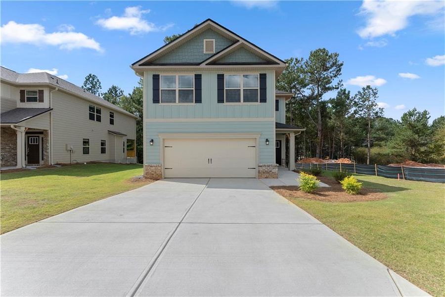 Front exterior of a new home in Magnolia Villas, Cornelia, GA, highlighting curb appeal (Image 20). Front exterior of a new home in Magnolia Villas, Cornelia, GA, highlighting curb appeal (Image 20).