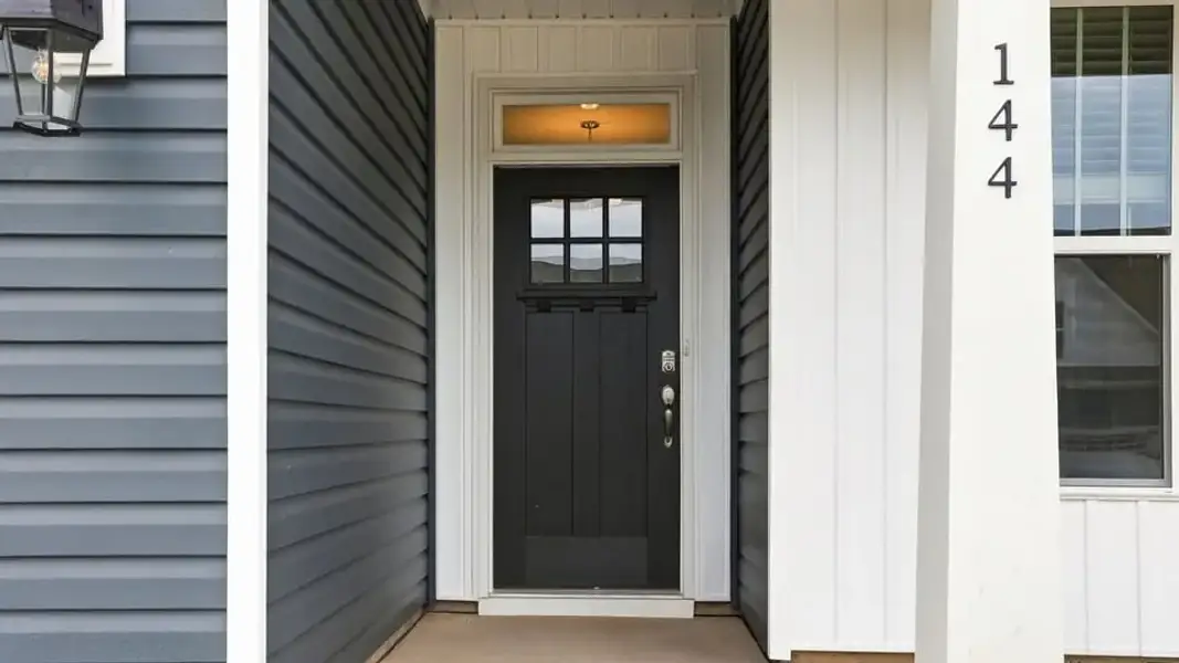 Exterior details and patio area of a home in Alder Pond, Campobello (Image 3).