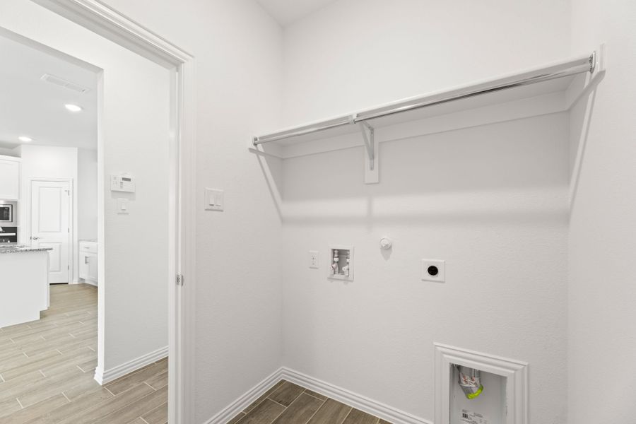 Representative unfurnished interior of a home built from the Salado by UnionMain Homes in Legacy Hills, Celina (Image 26).