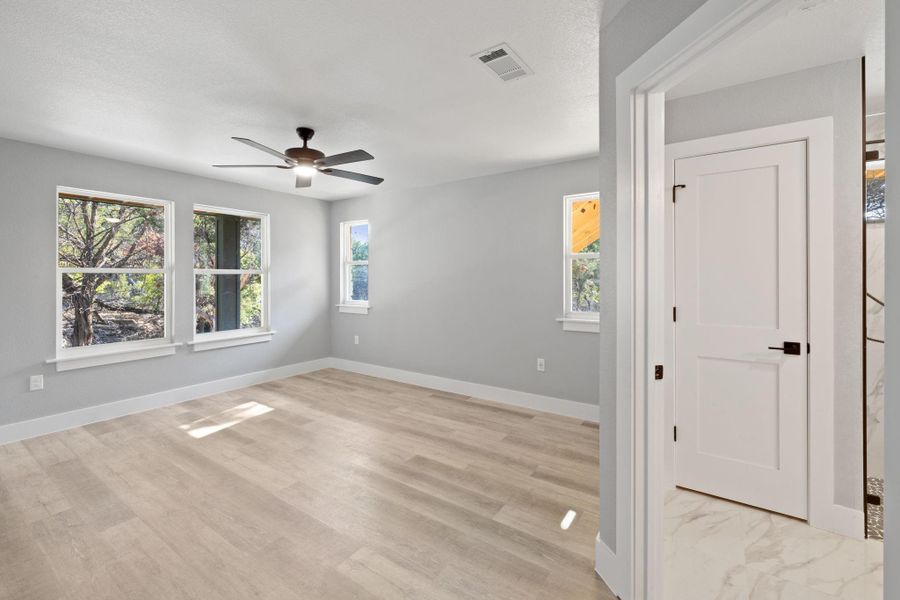 Downstairs bedroom #3 features an ensuite bathroom and walk in closet.