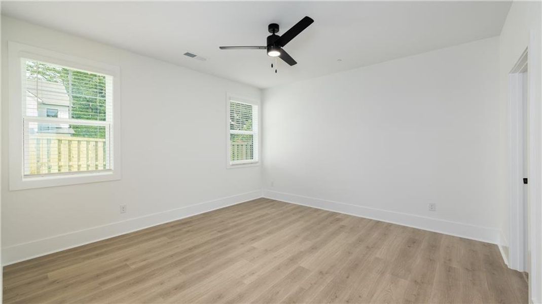 Spacious, unfurnished interior of a new home in The Village at Sandy Plains, Marietta (Image 12).