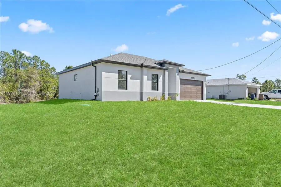 Exterior details and patio area of a home in , Lehigh Acres (Image 3).