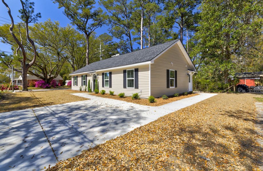 Front exterior of a new home in , Walterboro, SC, highlighting curb appeal (Image 33).