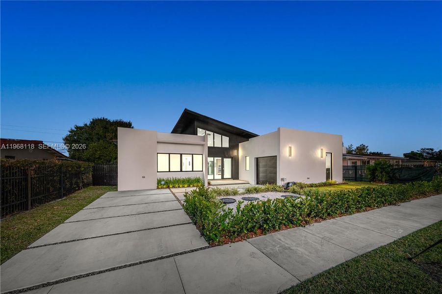 Front exterior of a new home in , Miami, FL, highlighting curb appeal (Image 26). Front exterior of a new home in , Miami, FL, highlighting curb appeal (Image 26).