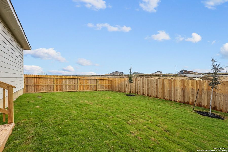 Exterior details and patio area of a home in Garden Grove, Schertz (Image 3).