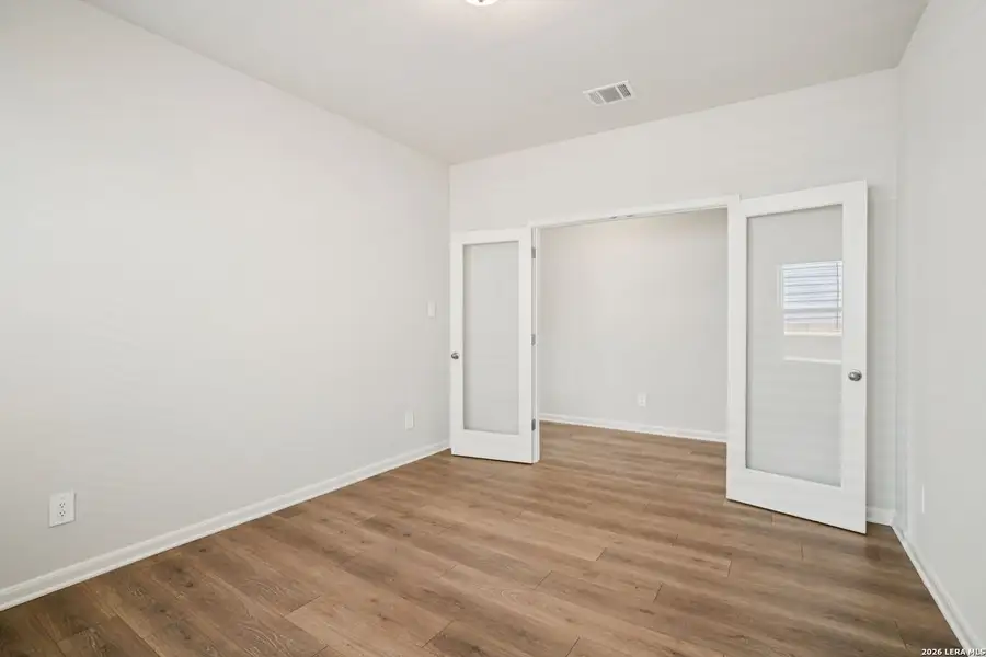 Spacious, unfurnished interior of a new home in Estancia Ranch - Classic Series, San Antonio (Image 17).