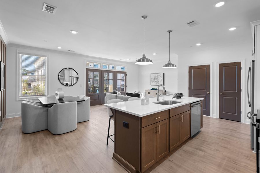 Representative furnished interior of a home built from the The Oleander by The Providence Group in Market Square at Sawnee Village, Cumming (Image 5).
