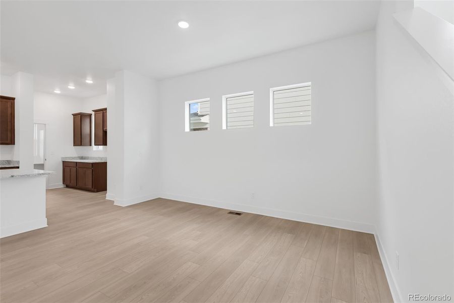 Spacious, unfurnished interior of a new home in Painted Prairie Cottage, Aurora (Image 23).