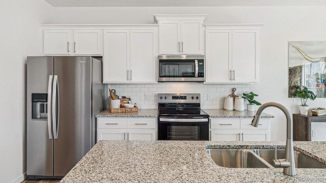 Furnished interior view inside a new home in The Ridge at Lorson Ranch, Colorado Springs (Image 18).