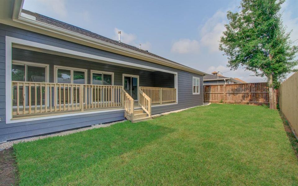 Relaxation comes easy in this meticulously designed back porch