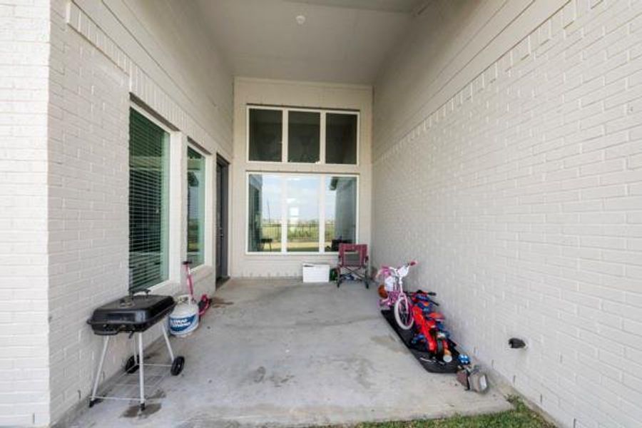 Exterior details and patio area of a home in , Katy (Image 3).