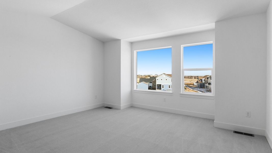 Furnished interior view inside a new home in Dillon Pointe - Skyview, Broomfield (Image 16).