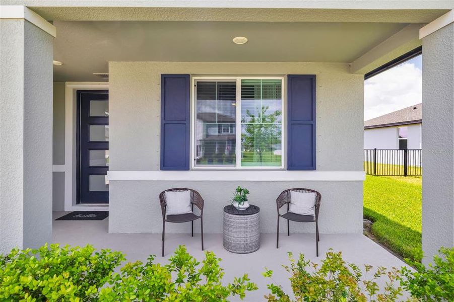 Exterior details and patio area of a home in , Parrish (Image 4).