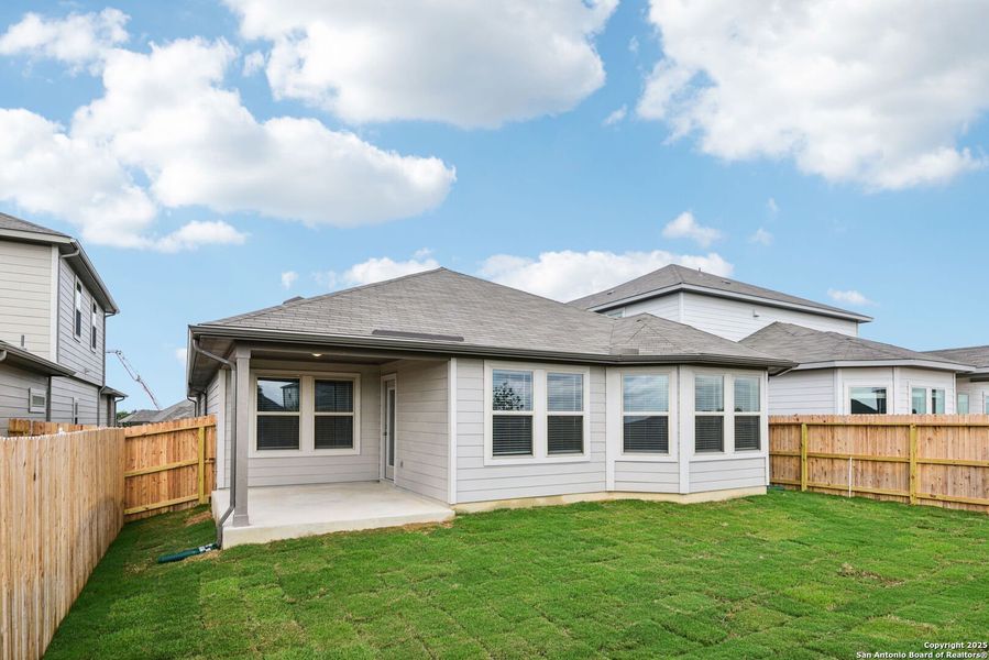 Front exterior of a new home in Legendary Trails - Premier Series, Cibolo, TX, highlighting curb appeal (Image 2). Front exterior of a new home in Legendary Trails - Premier Series, Cibolo, TX, highlighting curb appeal (Image 2).