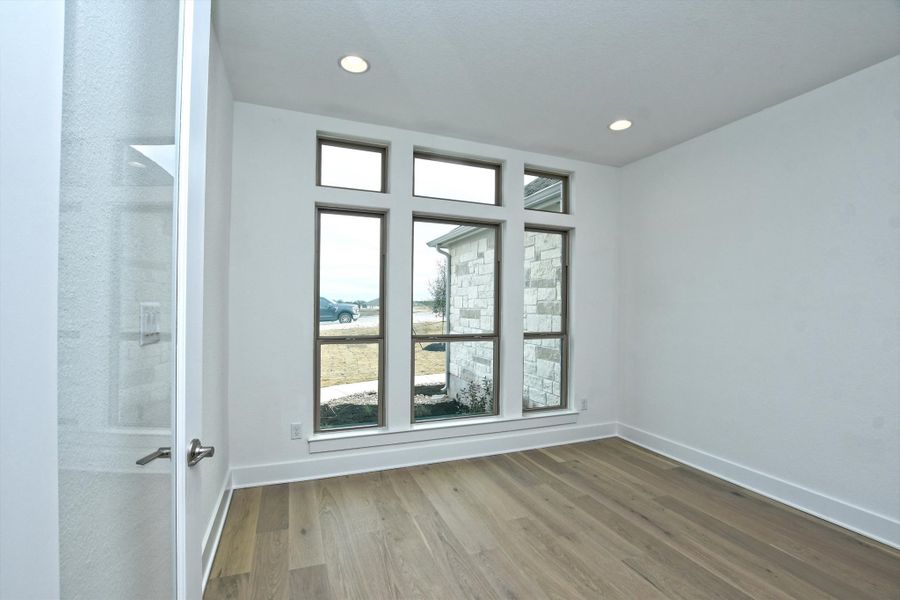 Representative unfurnished interior of a home built from the Madera II by Giddens Homes in Scofield Farms Estates, Georgetown (Image 435).