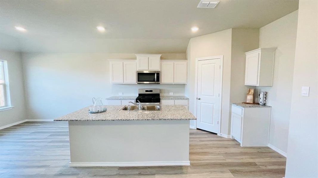 Kitchen - All Home and community information, including pricing, included features, terms, availability and amenities, are subject to change at any time without notice or obligation. All Drawings, pictures, photographs, video, square footages, floor plans, elevations, features, colors and sizes are approximate for illustration purposes only and will vary from the homes as built.
