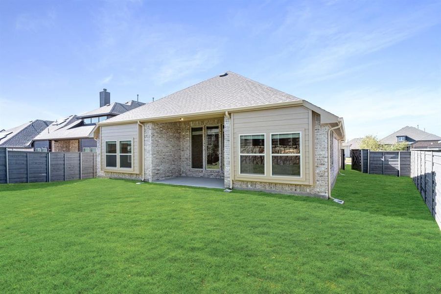 Exterior details and patio area of a home in Union Park Classic 60, Little Elm (Image 24).