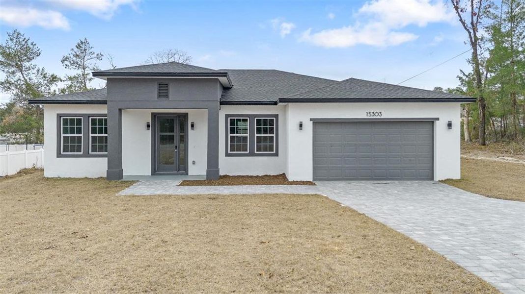 Front exterior of a new home in , Ocala, FL, highlighting curb appeal (Image 20).