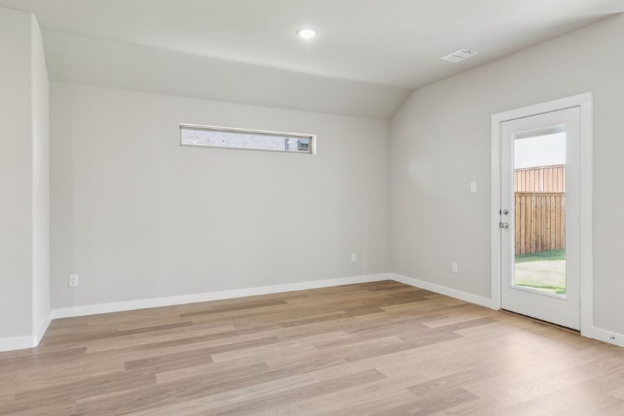 Dining room in the Heisman home plan by Trophy Signature Homes – REPRESENTATIVE PHOTO