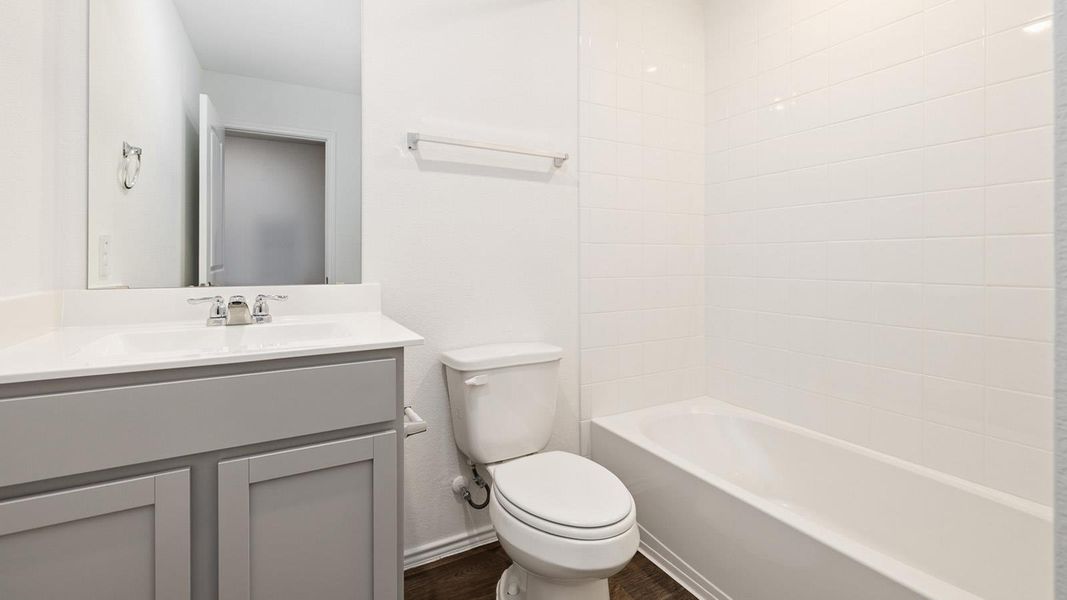 Furnished interior view inside a new home in Watermill, Uhland (Image 8).