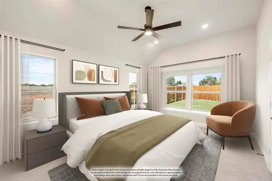 Bedroom with vaulted ceiling, ceiling fan, large windows, and neutral carpet flooring Bedroom with vaulted ceiling, ceiling fan, large windows, and neutral carpet flooring