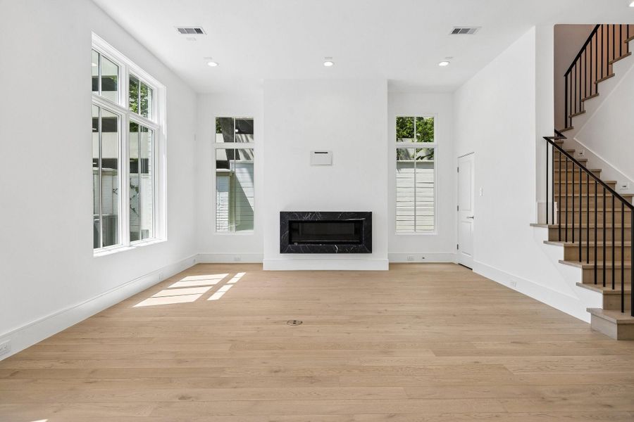 Another view of this large and bright living room.
