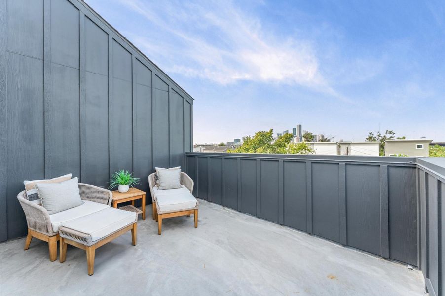 Rooftop deck with TV, water, and gas connections effortless entertaining and skyline views Rooftop deck with TV, water, and gas connections effortless entertaining and skyline views