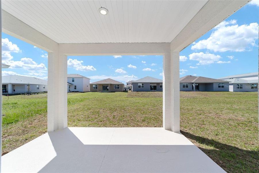 Exterior details and patio area of a home in Calesa Township, Ocala (Image 3).