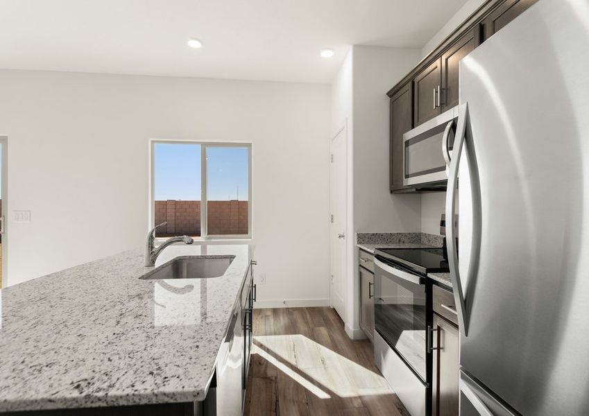 The kitchen comes with upgraded, stainless steel appliances included.
