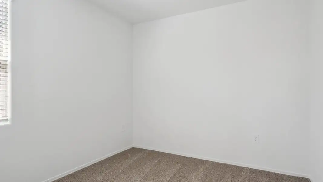 Spacious, unfurnished interior of a new home in Heartland Ranch, Coolidge (Image 21).