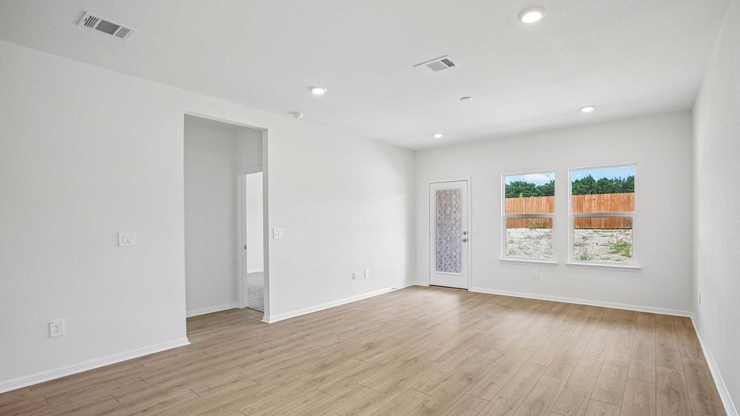 Spacious, unfurnished interior of a new home in Bar W Ranch, Leander (Image 17).