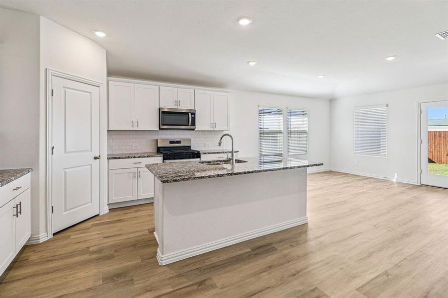 Furnished interior view inside a new home in River Ridge, Crandall (Image 9).