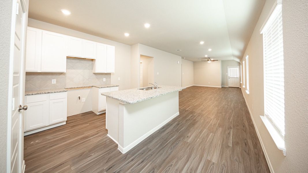 Kitchen to Dining Area and Family Room Kitchen to Dining Area and Family Room