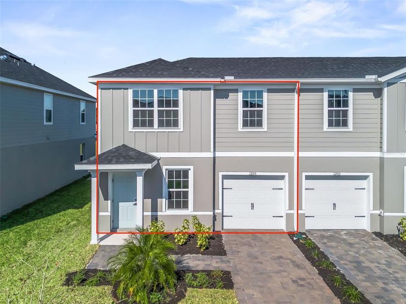 Front exterior of a new home in , Lady Lake, FL, highlighting curb appeal (Image 26).