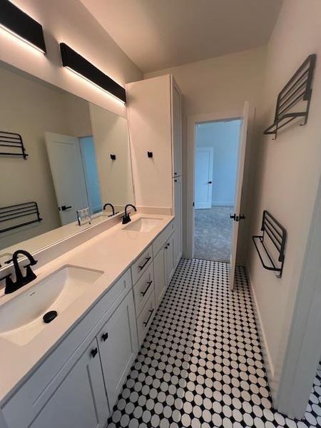 Bathroom featuring double vanity