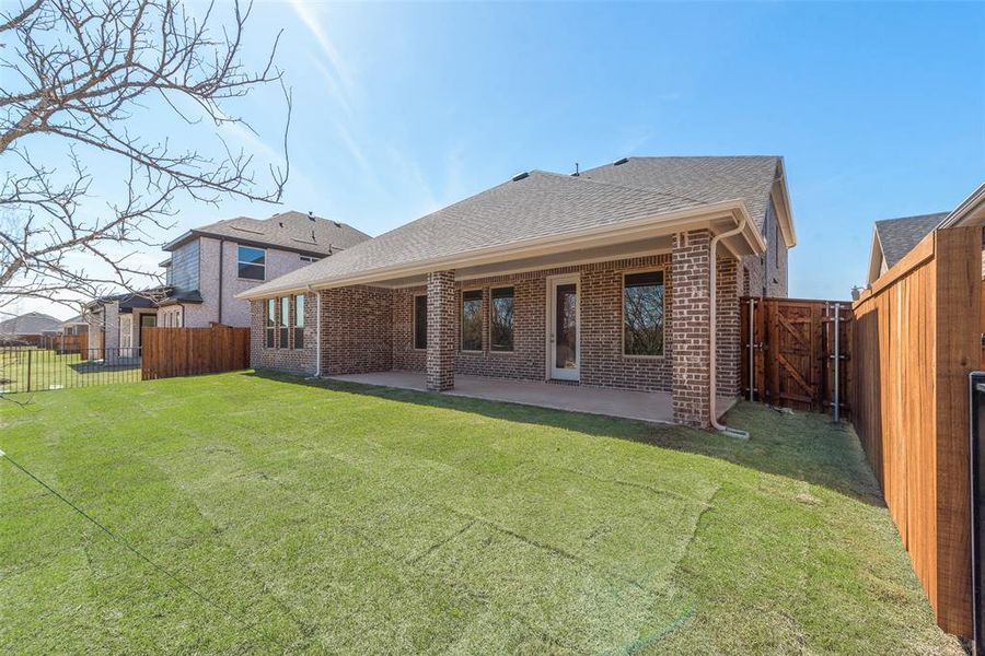 Front exterior of a new home in Valencia On The Lake, Little Elm, TX, highlighting curb appeal (Image 18).