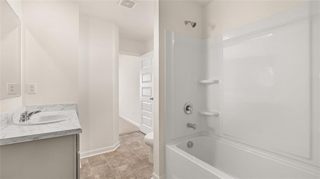 Furnished interior view inside a new home in Preserve at Dove Creek, Statham (Image 8).