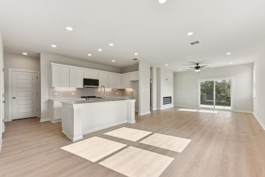 A kitchen with white cabinets. A kitchen with white cabinets.