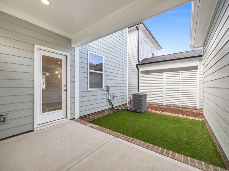 Exterior details and patio area of a home in Forestville Yard, Knightdale (Image 24).