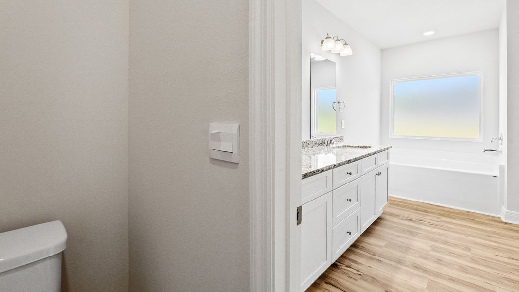 Representative furnished interior of a home built from the The Hawthorne by D.R. Horton in Meadows at Rehwinkel, Crawfordville (Image 27).