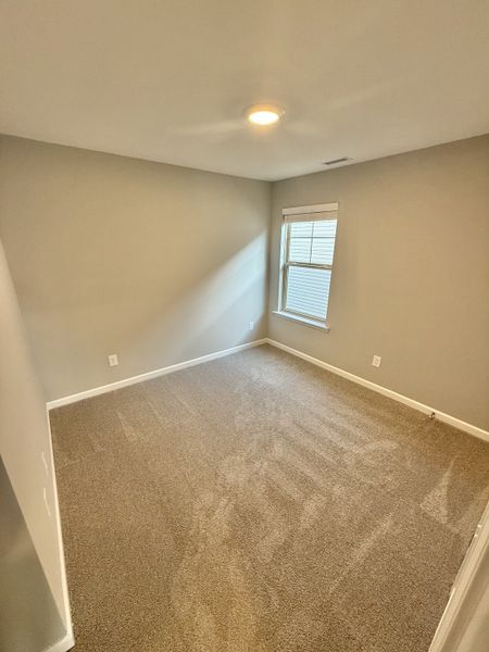 Spacious, unfurnished interior of a new home in Stonehenge, Manchester (Image 8).