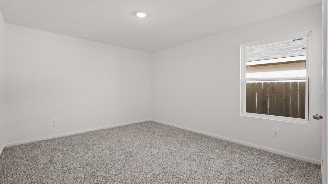 Representative unfurnished interior of a home built from the Denton by D.R. Horton in New Waverly Station, New Waverly (Image 15).