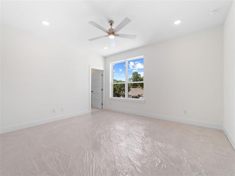 Spare room featuring recessed lighting and ceiling fan