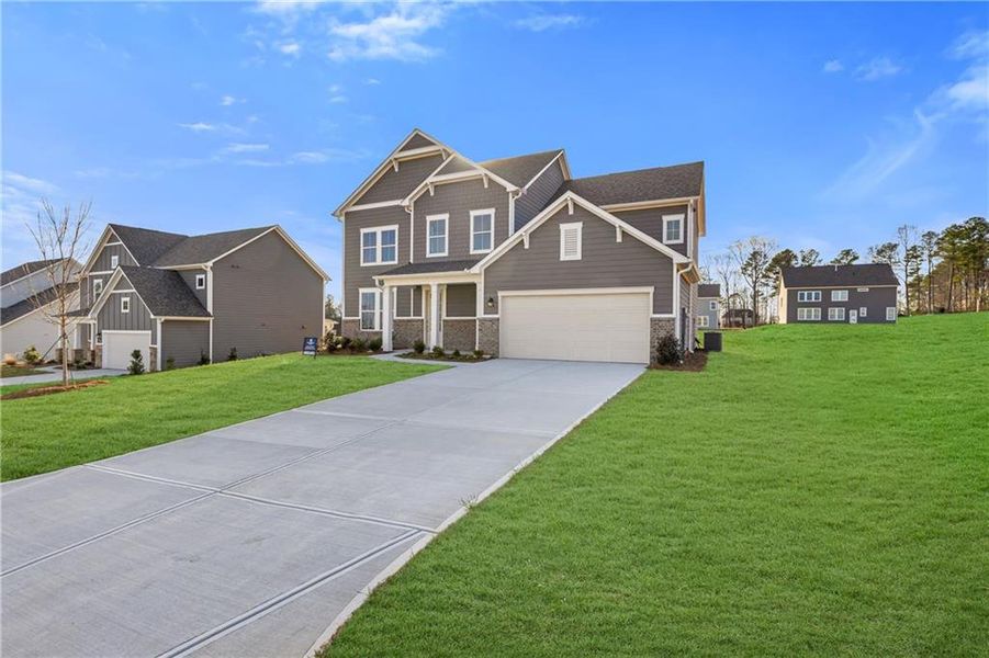 Front exterior of a new home in Pickens Bluff, Hiram, GA, highlighting curb appeal (Image 20).