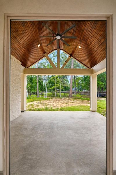 Exterior details and patio area of a home in , New Caney (Image 3).