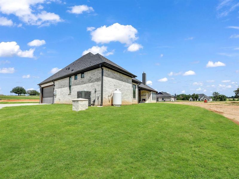 Exterior details and patio area of a home in , Weatherford (Image 4).