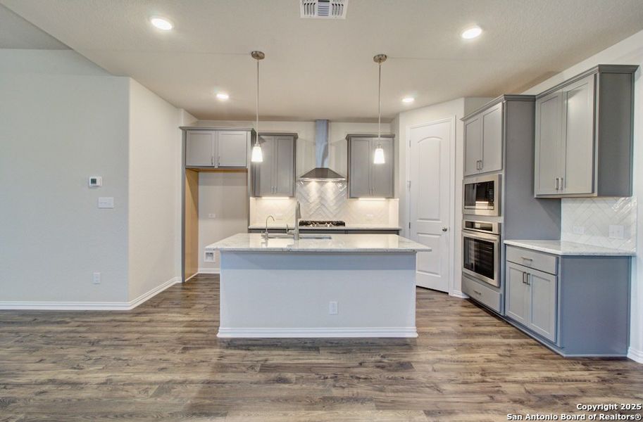 Furnished interior view inside a new home in Meyer Ranch - Enclave, New Braunfels (Image 8).