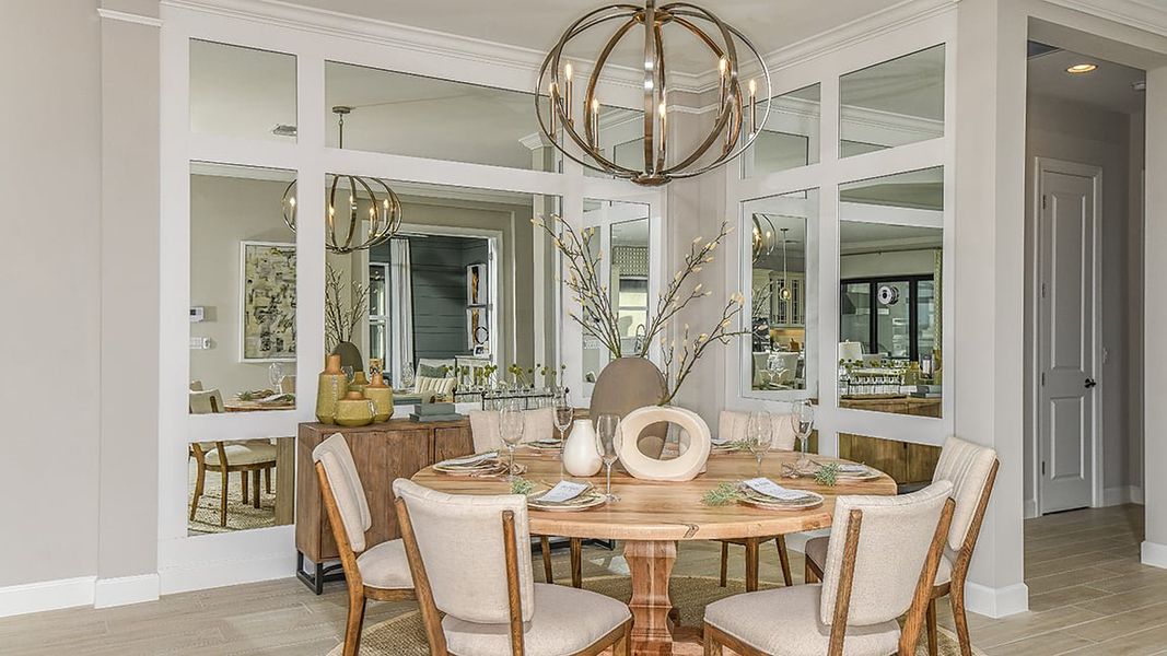 Furnished interior view inside a new home in Esplanade Lake Club, Fort Myers (Image 9).